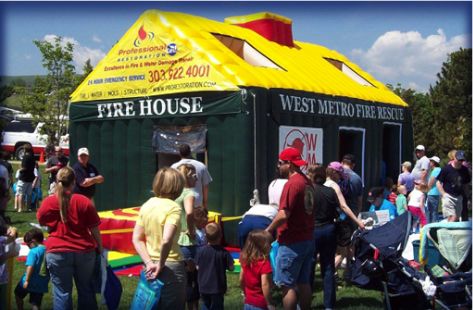 Inflatable fire education house at community event